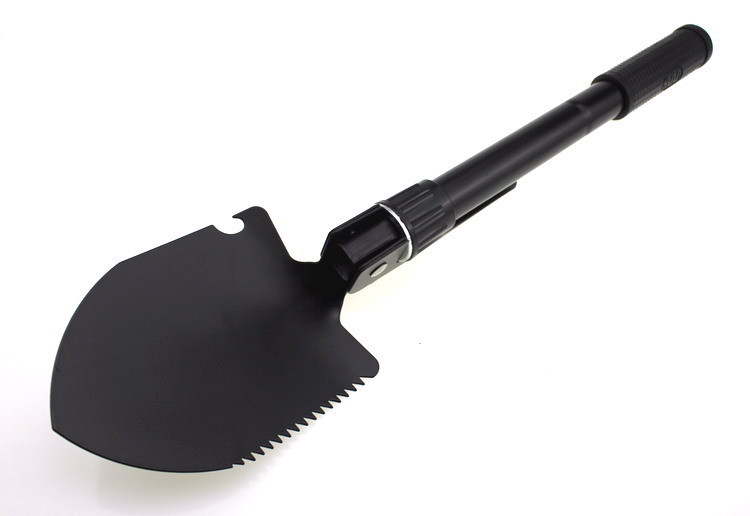 Black shovel head with serrated edge for digging and cutting